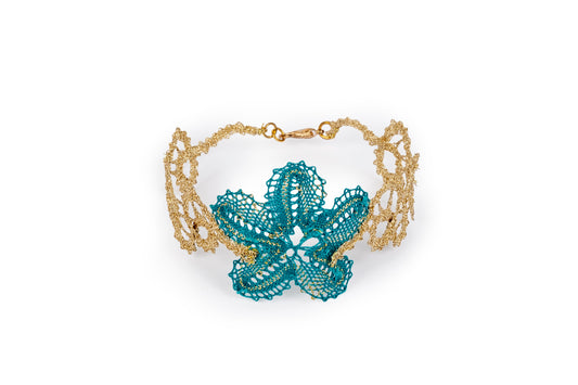 Bracciale in merletto con fiore ottanio