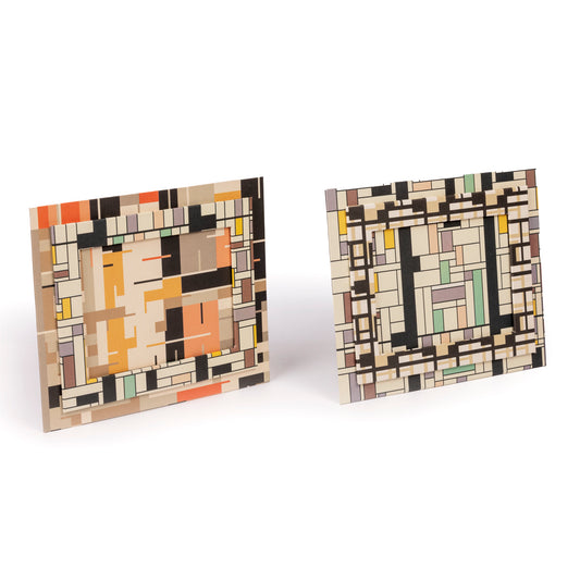 Coppia di cornici in cartone rivestito con carta a stampa “modernista”