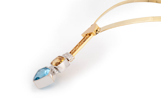 Girocollo scultura con topazio azzurro e giallo
