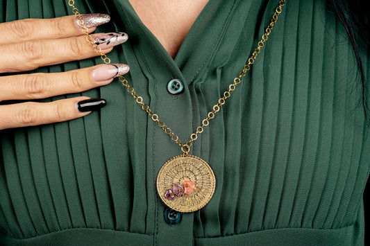 Ciondolo in merletto colore oro metallizzato