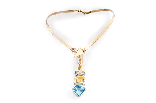 Girocollo scultura con topazio azzurro e giallo