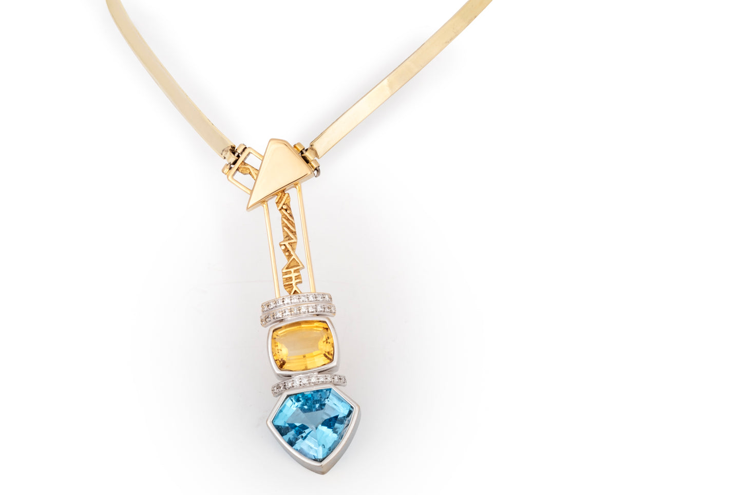 Girocollo scultura con topazio azzurro e giallo